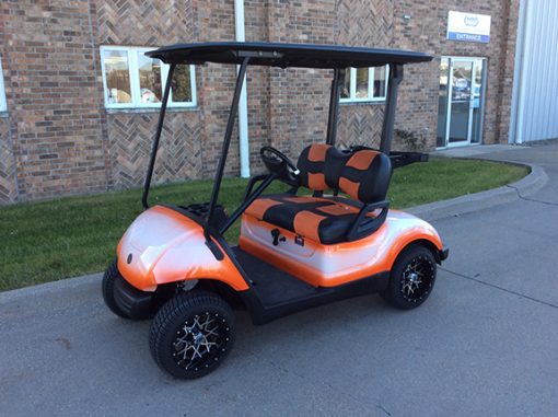 Custom White and Orange Golf Car