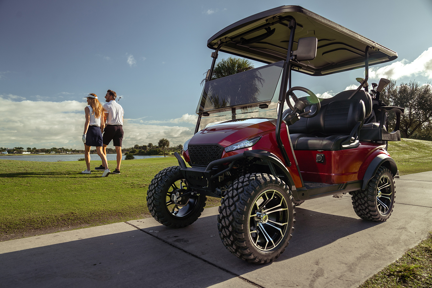 Teal MadJax Golf Car